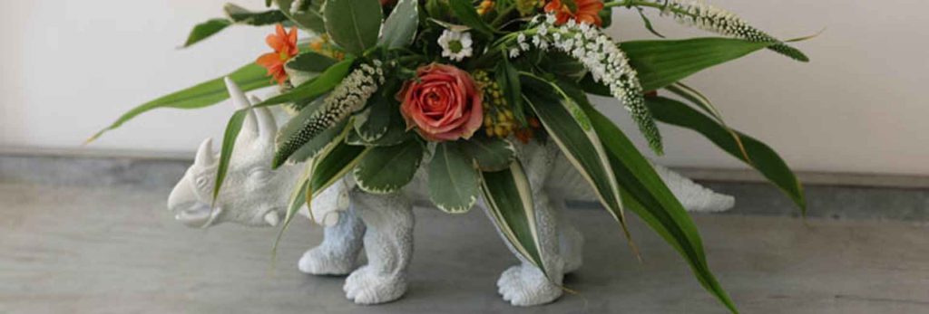 alternative wedding centrepiece flower dinosaur decor